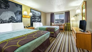 A hotel room with two beds, a television, a desk, and a window with curtains. - Super 8 Sheridan (Sheridan)