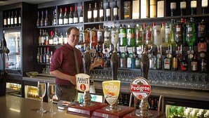 A bar with multiple liquor bottles and three beer taps labeled 'Abbott Ale,' 'Cold,' and 'Pedigree.' - Staindrop Lodge Hotel (Sheffield)