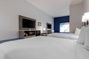 A hotel room with two beds, a TV, a desk with a chair, a microwave, and a refrigerator. - Best Western Plus Choctaw Inn & Suites (Choctaw)