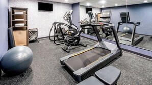 A gym with treadmills, elliptical machines, and exercise balls. - La Quinta Inn Suites Richmond Kings Dominion (Doswell)