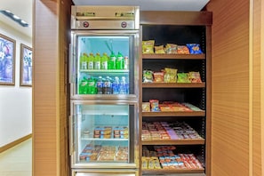 A vending machine with beverages and snacks. - Manassas Hotel (Manassas)