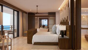 A modern bedroom with a large bed, a seating area with a view, and a balcony.