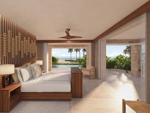 Un dormitorio moderno con una cama grande, ventilador de techo y vistas a un paisaje tropical.
