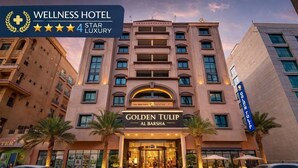 A 4-star luxury hotel with a prominent entrance, multiple floors, and a modern facade. - Orchid Hotel Al Barsha Formerly Golden Tulip Al Barsha (Dubai)