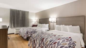 Desk, blackout drapes, WiFi (free), bed sheets