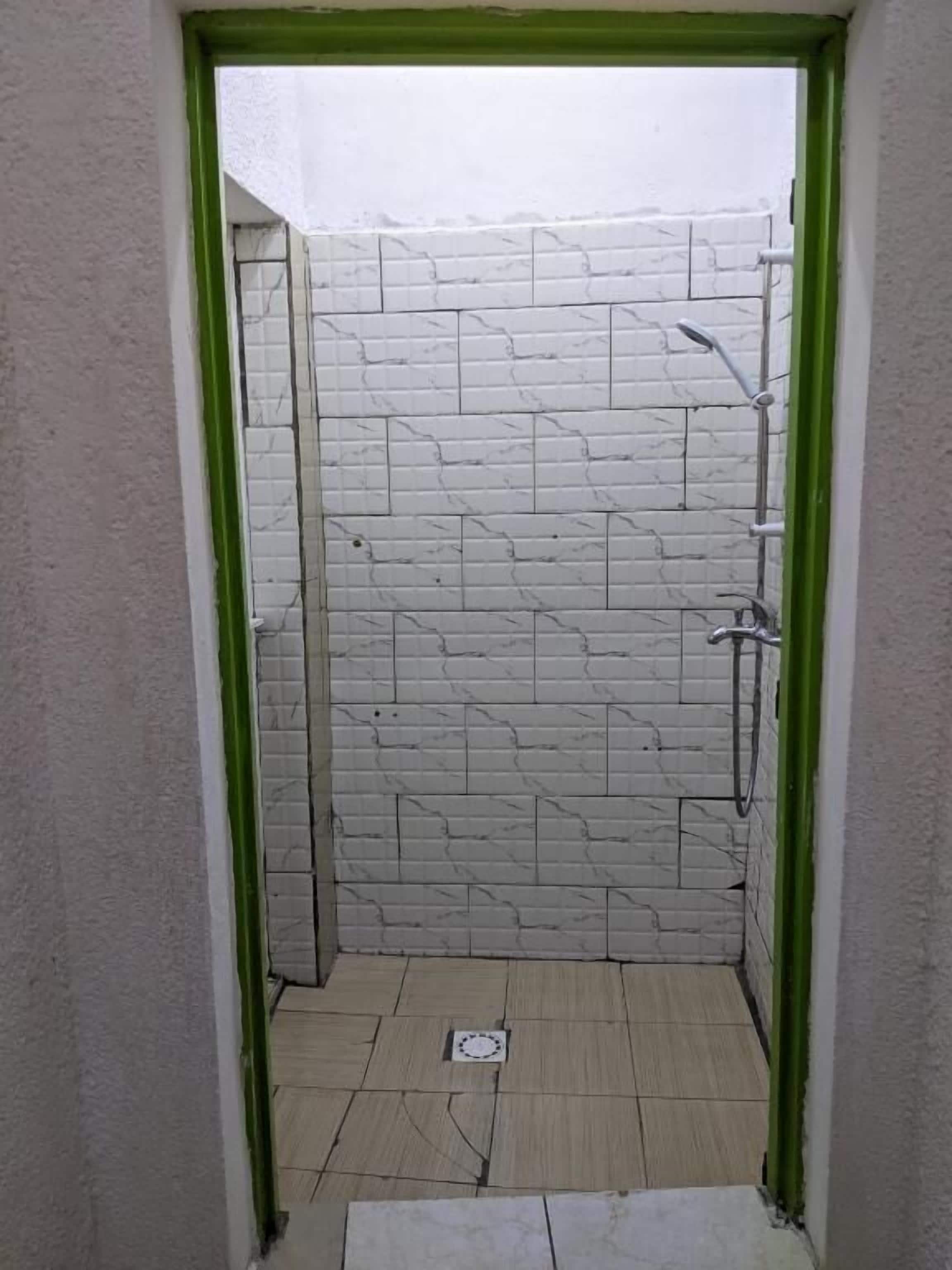 Standard Twin Room, Balcony, Courtyard View | Bathroom | Slippers