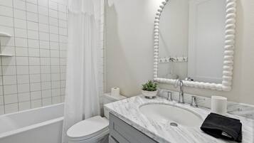 Hair dryer, towels, soap, shampoo