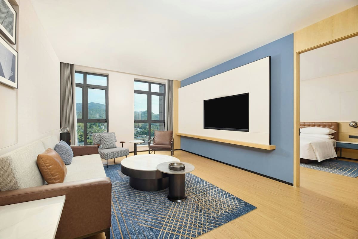 Suíte executiva, 1 quarto | Área de estar