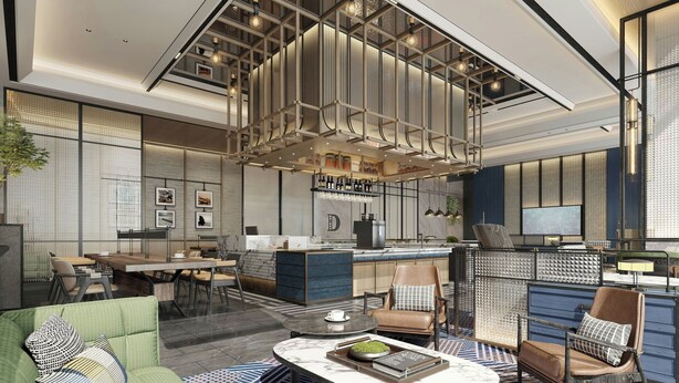 Un interior moderno con comedor, cocina y zona de estar.