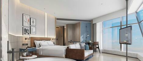 Une chambre d’hôtel moderne dotée d’un grand lit, d’un coin salon, d’une télévision et d’une grande fenêtre.