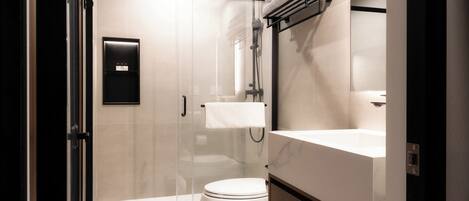 Shower, hair dryer, towels, soap