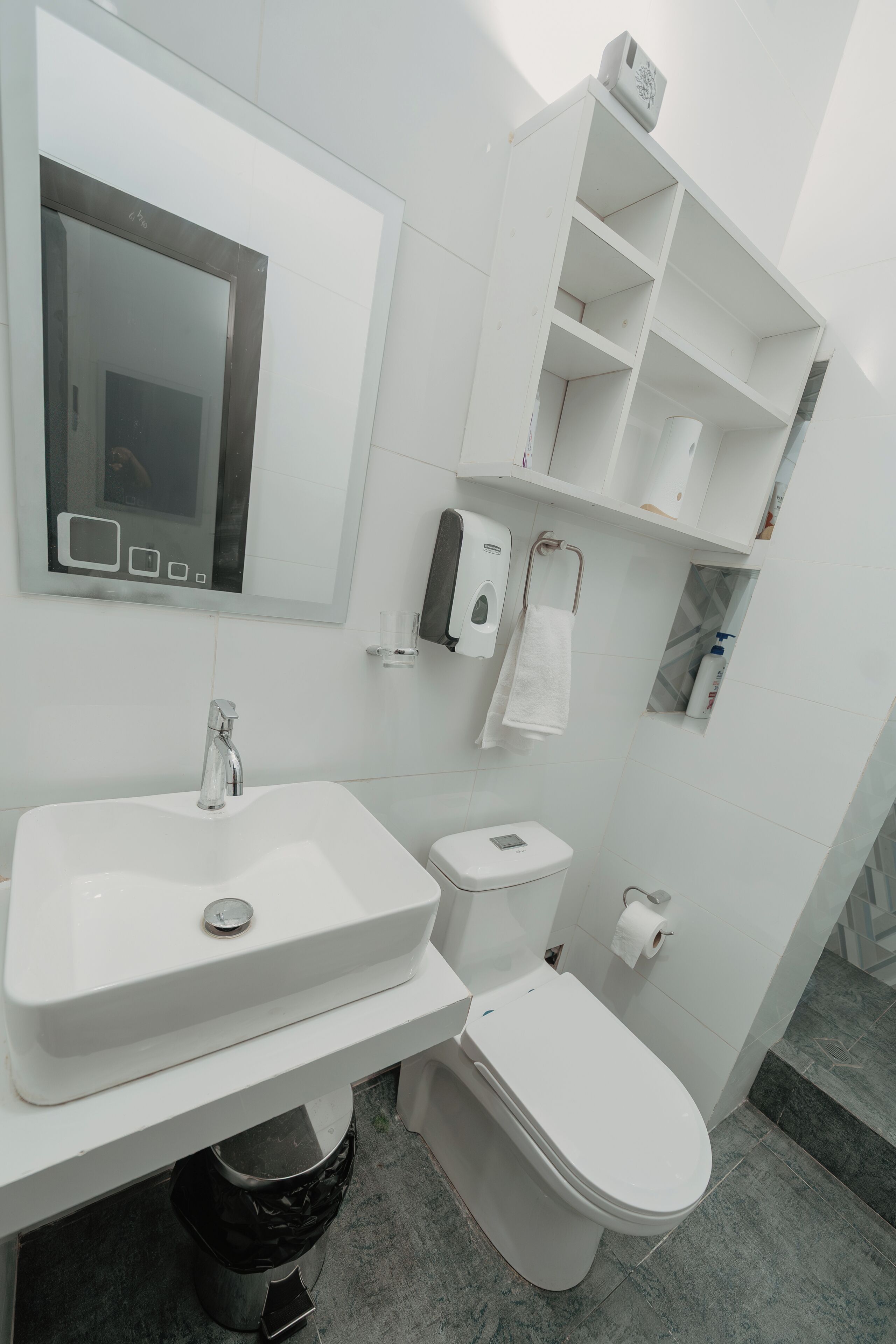 Shower, towels, soap, toilet paper