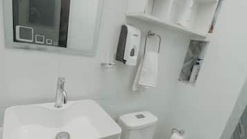 Shower, towels, soap, toilet paper