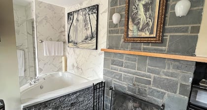 Riverview Suite w/ Queen or King Bed and Jacuzzi Tub