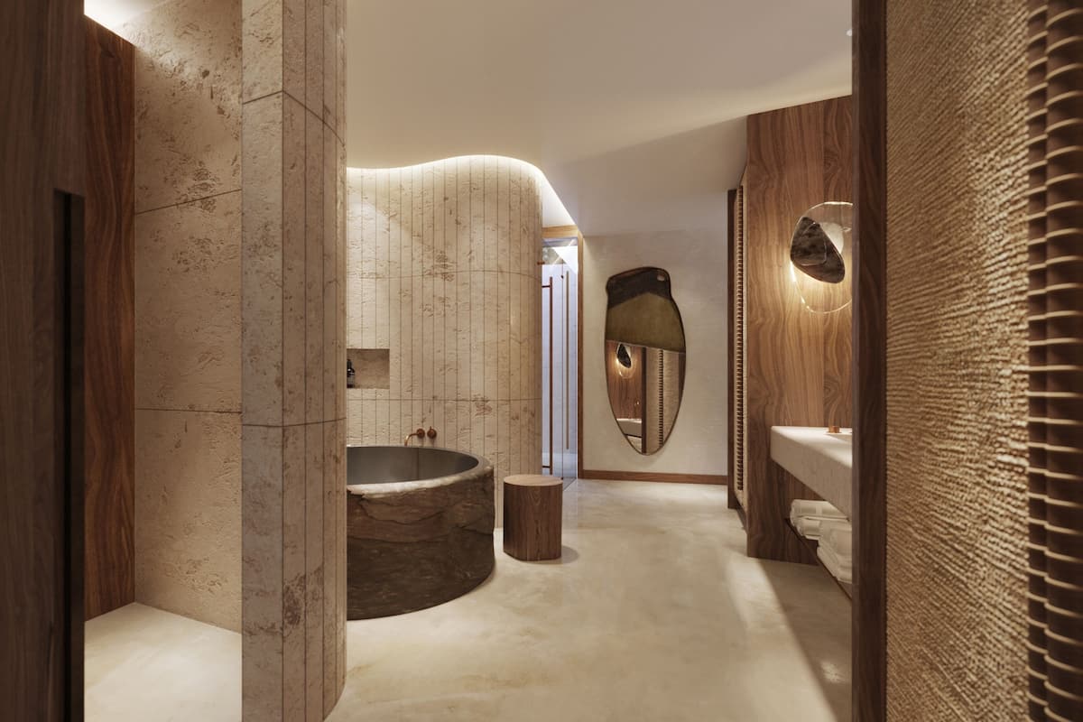 A modern bathroom with a freestanding bathtub, a wooden vanity, and a large mirror.