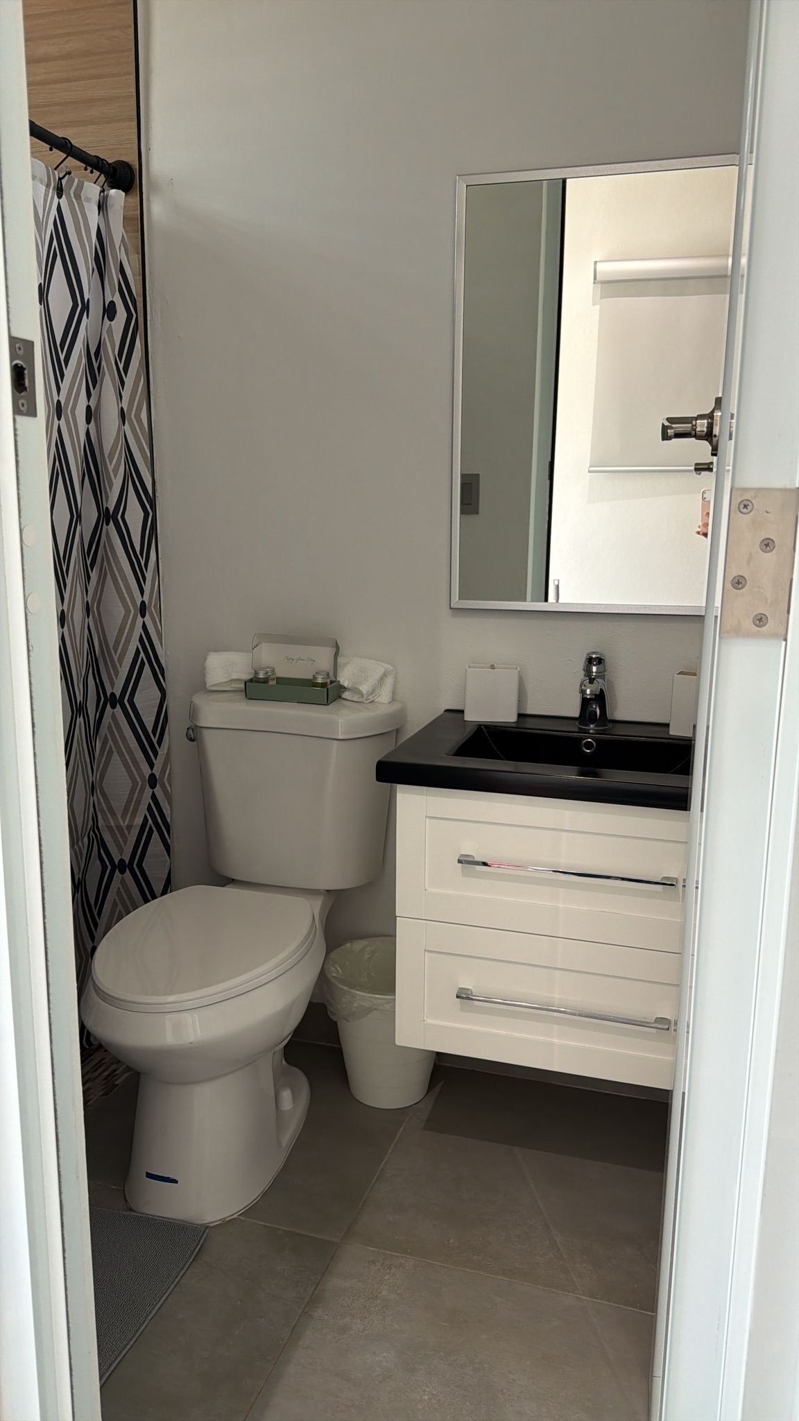 Shower, towels, soap, toilet paper