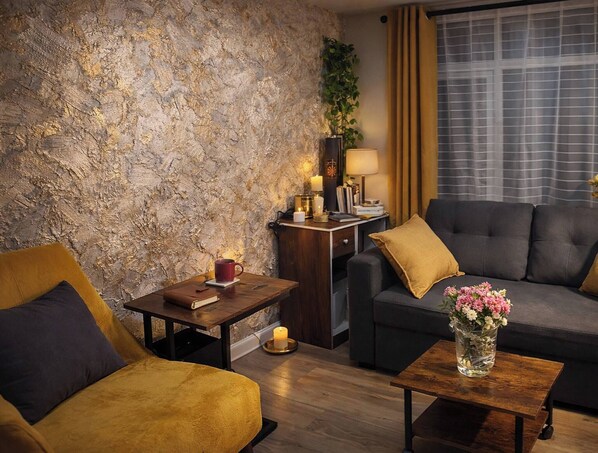 Apartment, 1 Schlafzimmer, Terrasse | Wohnzimmer | Bücher