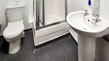 Regadera, amenidades de baño gratuitas, toallas, jabón