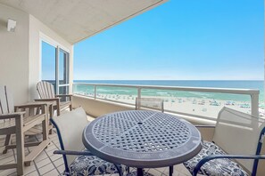 Outdoor dining - The Enclave 502 | Beachfront | Private Balcony | Indoor Pool | My Beach Getaways (Orange Beach)