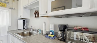 Charming condo w/ lake access, dock, WiFi & mountain views