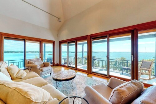 Delightful oceanfront home with amazing views, wrap-around deck & two fireplaces