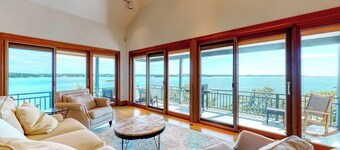 Delightful oceanfront home with amazing views, wrap-around deck & two fireplaces
