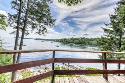 Unique oceanfront home with a deck, tons of natural light, & amazing views