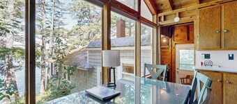 Lakefront cottage with dock, screened porch, & Island in Biscay Pond