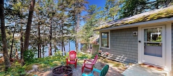 Lakefront cottage with dock, screened porch, & Island in Biscay Pond