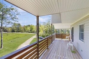 Terrace/patio - Modern farmhouse with deck, firepit, & balcony (Northport)