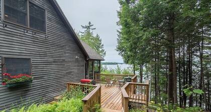 Gorgeous lakefront home w/ dock, canoe, kayaks & lake/forest views