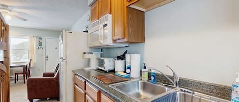 Fridge, microwave, coffee/tea maker, toaster