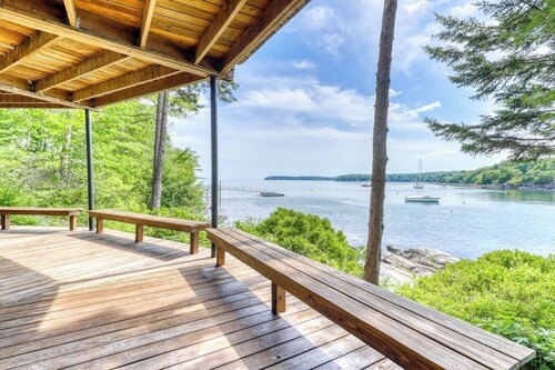 Delightful oceanfront home with amazing views, wrap-around deck & two fireplaces