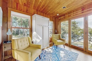 TV, fireplace - Waterfront Paradise with Dock, Big Yard, Sundeck & Epic Bay Views | Dog-Friendly (East Boothbay)