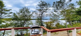 Luxurious waterfront home with deck, firepit, hot tub, fireplace, & pool table
