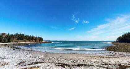 Tranquil getaway on the coast with beach access, ocean views, & screened porch