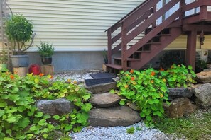 Property grounds - Sunny coastal retreat with deck, grill, beach, dock, & ocean access (East Boothbay)