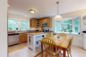 Fridge, microwave, oven, stovetop - Sunny coastal retreat with deck, grill, beach, dock, & ocean access (East Boothbay)
