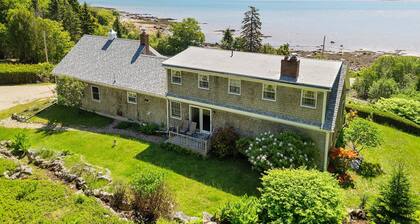 Dog-friendly oceanfront home with private shorefront, two fireplaces, & firepit