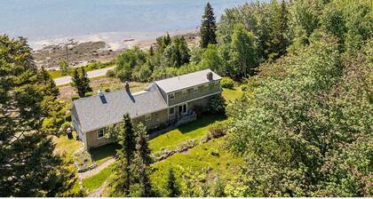 Dog-friendly oceanfront home with private shorefront, two fireplaces, & firepit