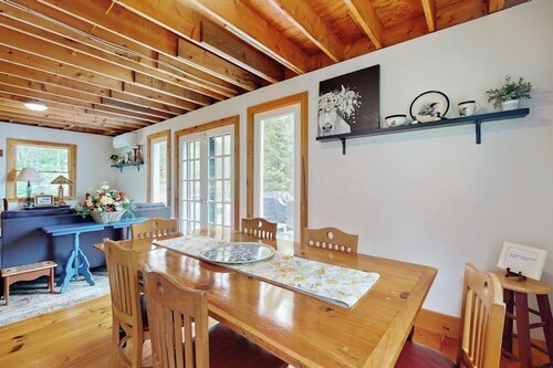 Sunny, lakefront home on South Pond with private dock, great deck & firepit