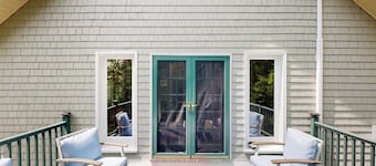 Sunny, lakefront home on South Pond with private dock, great deck & firepit