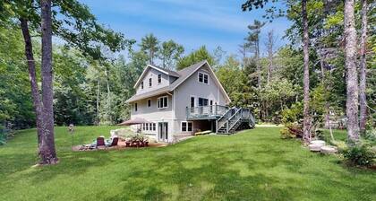 Sunny, lakefront home on South Pond with private dock, great deck & firepit
