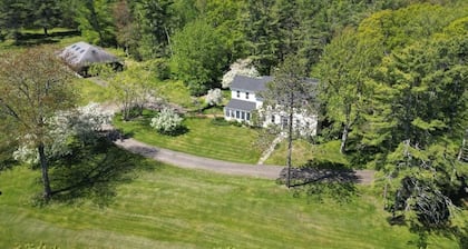 Renovated farmhouse on an acreage with grill, four-bedrooms, & W/D - river views