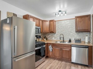 Fridge, microwave, oven, stovetop - WALK TO EVERYTHING, REMODELED, BEAUTIFUL NEIGHBORHOOD, LARGE YARD, AND FENCED! (Williams)