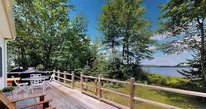 Waterfront home on Graham Lake with kayaks, bikes, firepit & fireplace