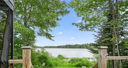 Waterfront home on Graham Lake with kayaks, bikes, firepit & fireplace