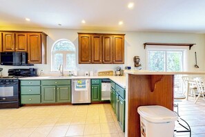 Fridge, microwave, oven, stovetop - Maine Country Getaway | Creekside house in Holden with deck & great location (Holden)