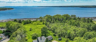 Waterfront stay with scenic deck, grill, smart TVs, shore access - dog-friendly
