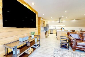 TV, fireplace - Dog-friendly apartment by Moosehead Lake with sprawling deck & firepit (Rockwood)
